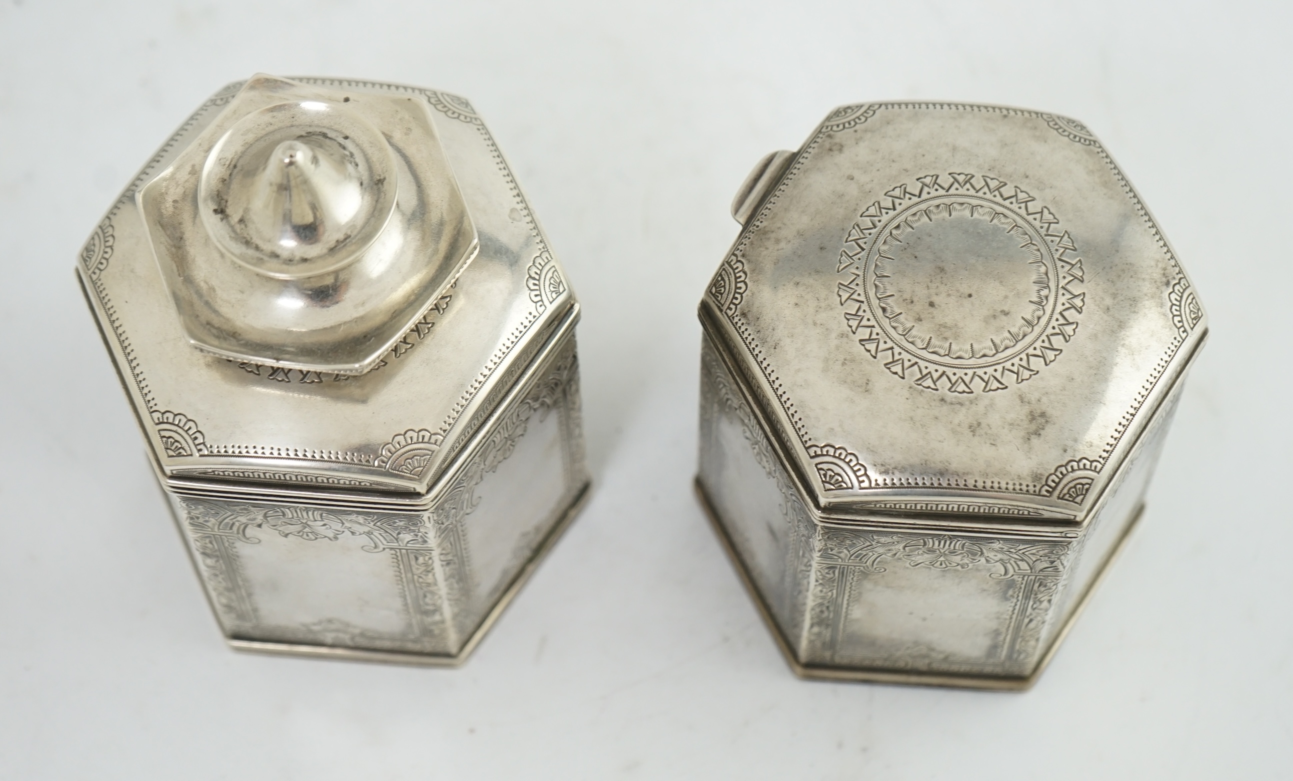 Two similar late 19th/early 20th century Russian 84 zolotnik silver tea caddies, master Varvara Baladanov